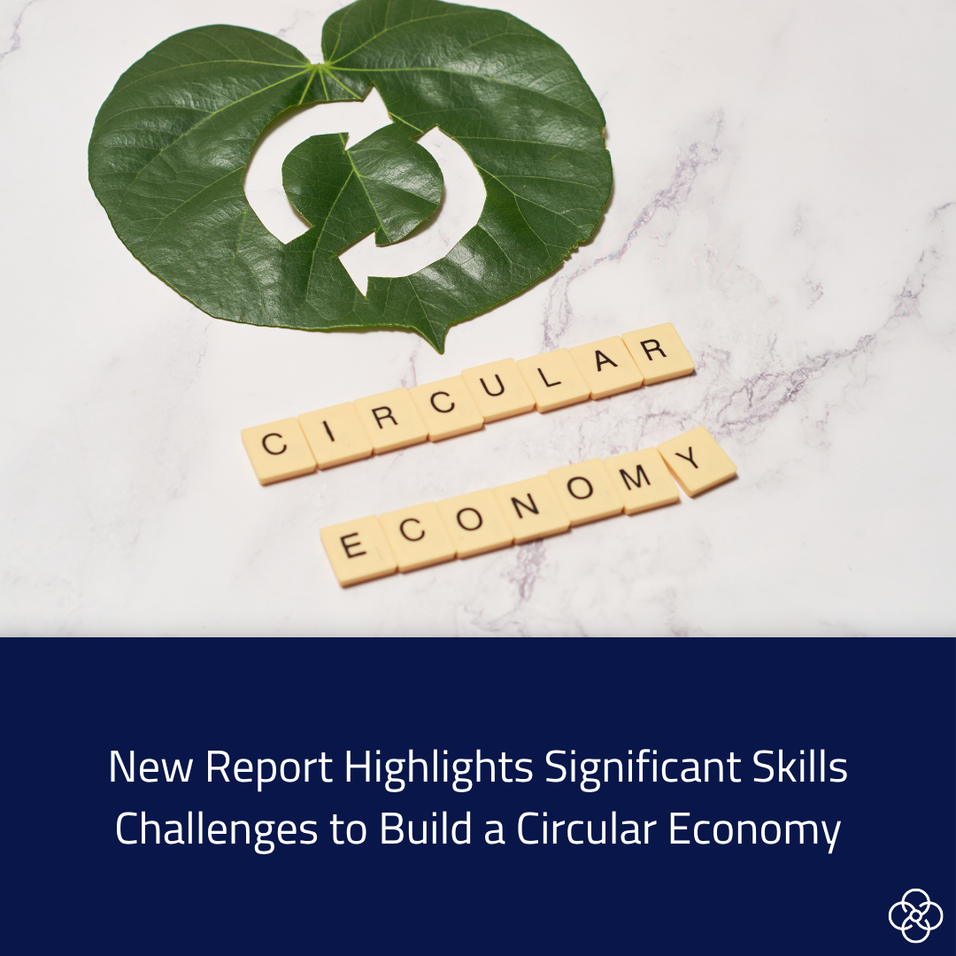 a green heart shaped leaf, with a white recycling arrows on it. The words circular economy are spelled out using letter tiles, underneath the leaf.